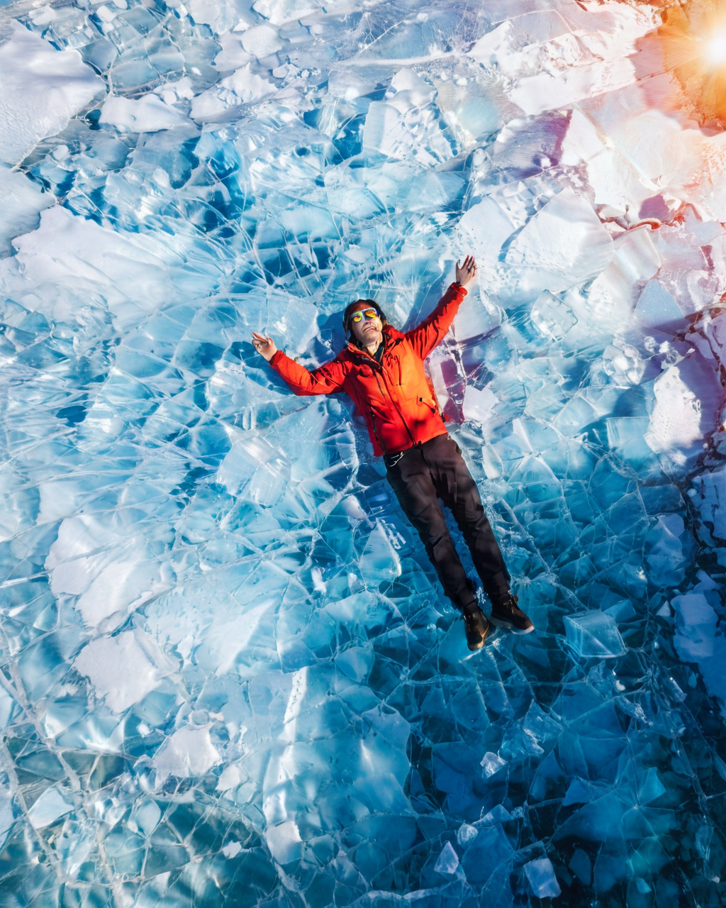 00038-405761008-vertical perspective aerial photography, sunlight_shadow, blue ice, looking_up,  lying_down,  _lora_sky_0.8_.png